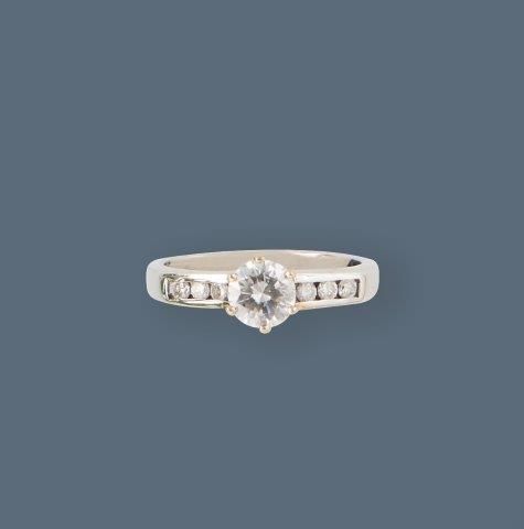 BAGUE en or gris (750) sertie d'un diamant...