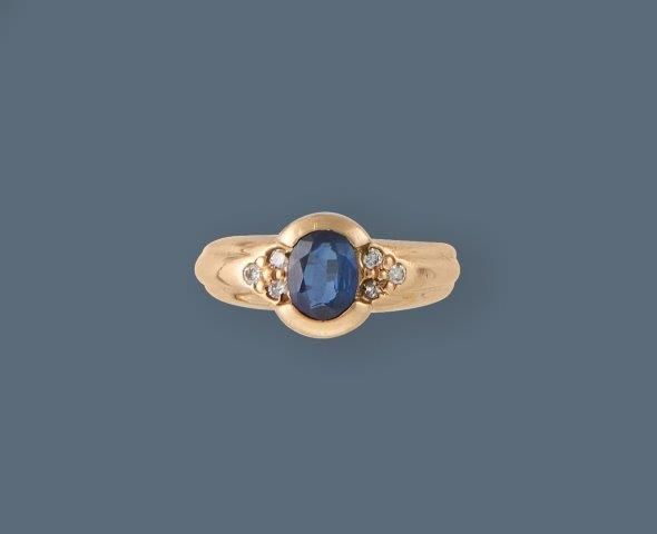 BAGUE en or jaune (750) ornée d'un saphir...