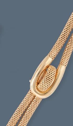 BRACELET-MONTRE DE DAME en or jaune (750)...
