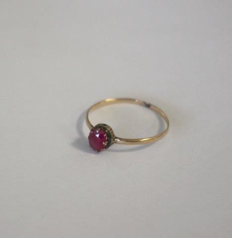 BAGUE DE JEUNE FILLE en or bas titre et sertie...