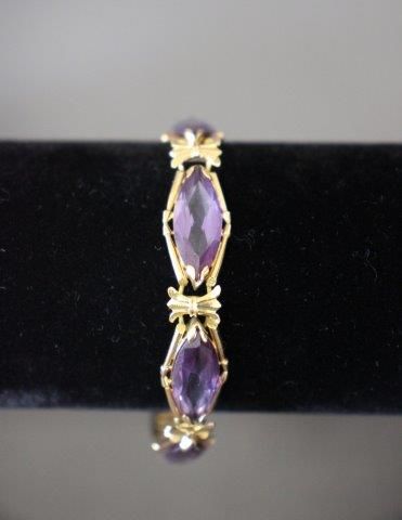 BRACELET SOUPLE en or jaune (750) orné de...