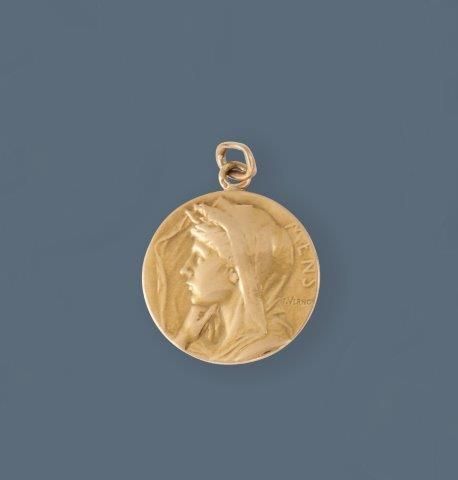 MEDAILLE en or jaune (750) au profil de la...