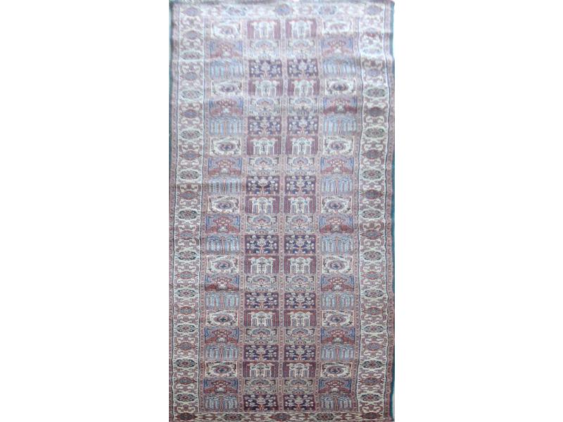 TAPIS GALERIE en laine à décor géométriques...