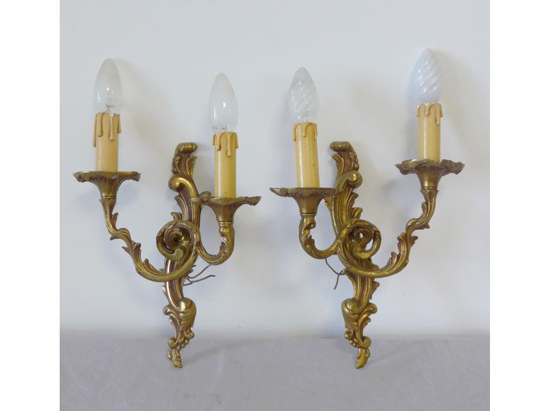 PAIRE D'APPLIQUES en bronze à deux bras de...