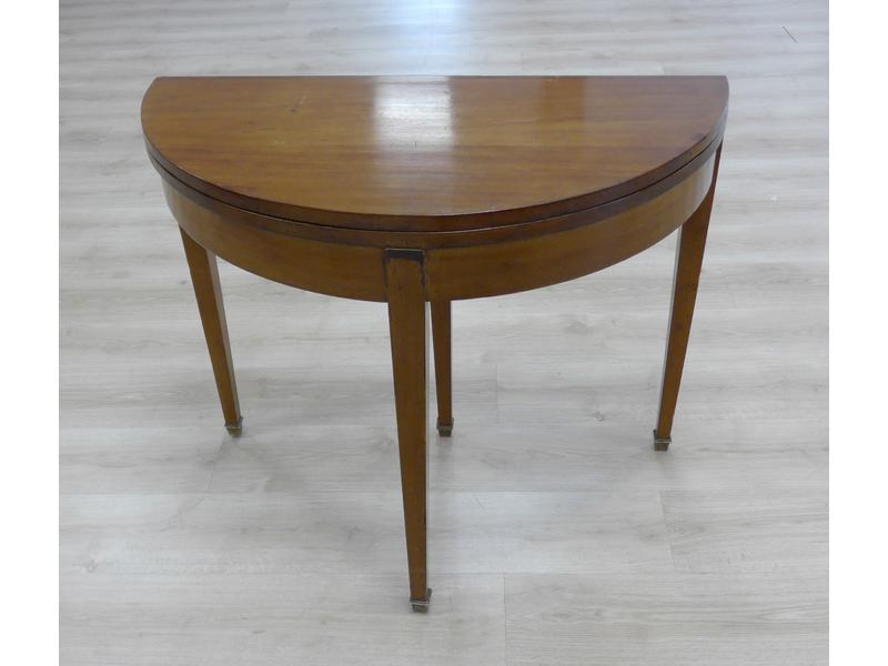 TABLE demi-lune en placage d'acajou, plateau...