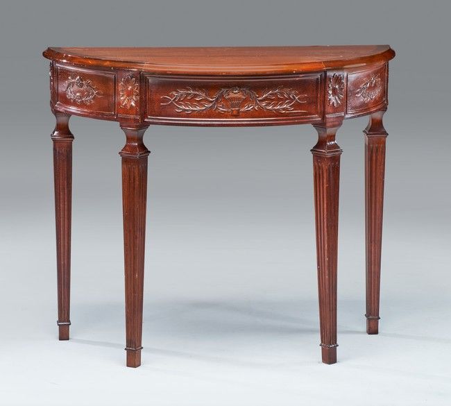 CONSOLE D'APPLIQUE demi-lune en acajou et...