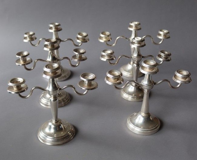 SIX BOUGEOIRS en métal argenté à deux bras...