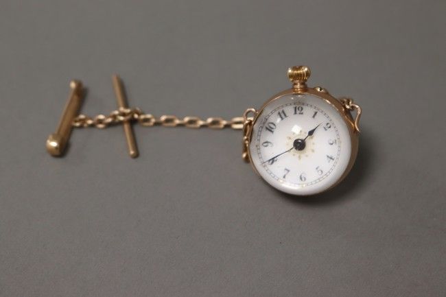 BROCHE MONTRE GLOBE en or jaune (585) en...