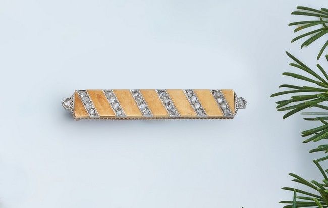 BROCHE BARETTE en or jaune (750) sertie de...