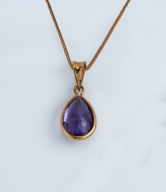 PENDENTIF et sa CHAÎNE en or jaune (750)...