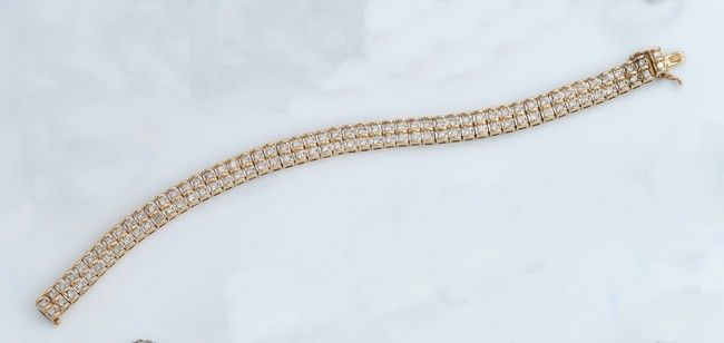 BRACELET doubles lignes souple en or jaune...