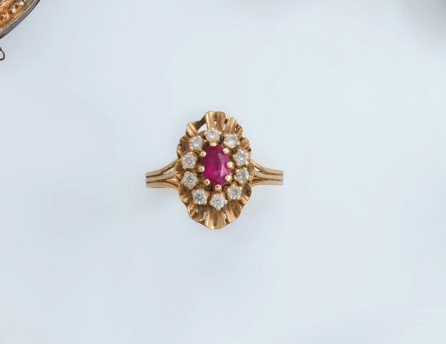 BAGUE MARGUERITE en or jaune (750) ornée...