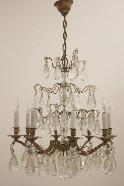 LUSTRE cage en bronze à huit lumières et...