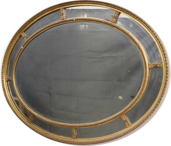 MIROIR ovale biseauté à parecloses dans un...