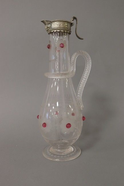 AIGUIERE de forme balustre en verre soufflé...