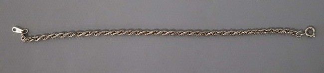 BRACELET à maillons tournés en métal arg...