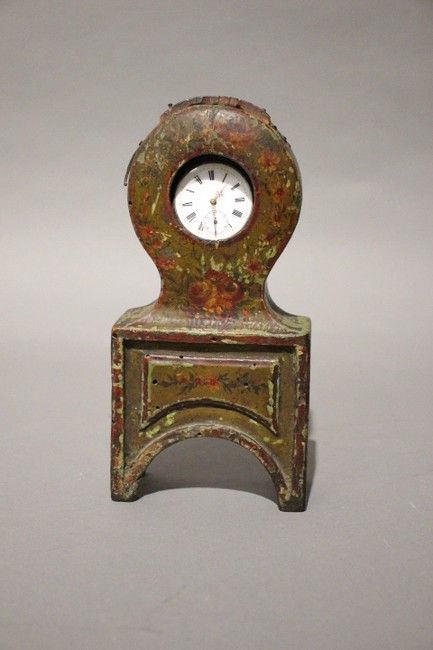 PORTE-MONTRE en forme de pendule tête de...