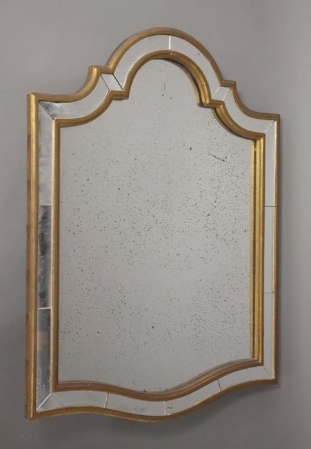 MIROIR A PARECLOSES en bois mouluré et doré...