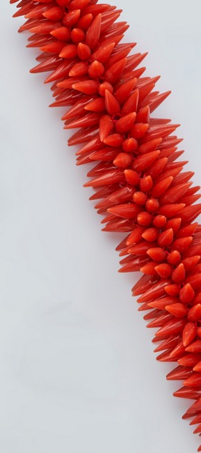 IMPORTANT COLLIER en perles de corail rouge...