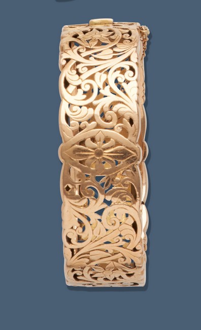 BRACELET rigide articulé en or jaune (750)...