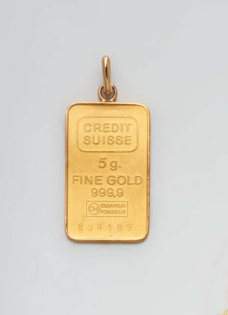 PENDENTIF CRÉDIT-SUISSE en or jaune (999),...