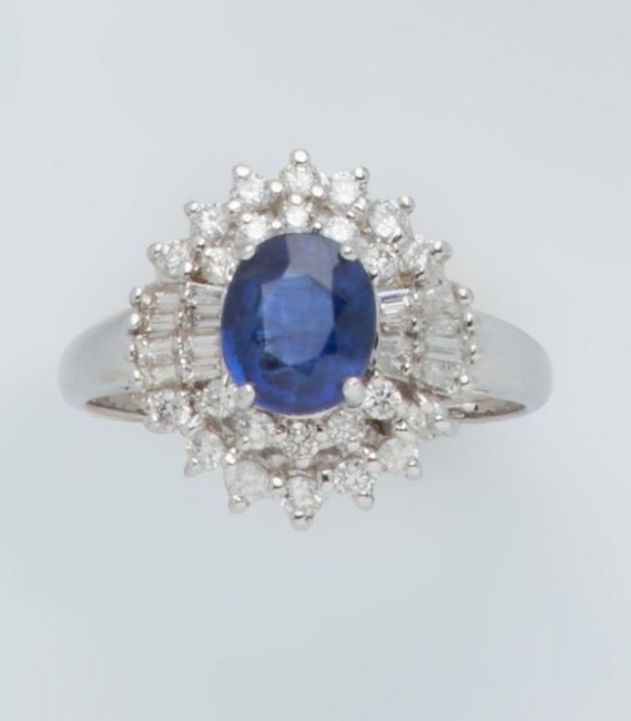 BAGUE marguerite en or gris (750) sertie...