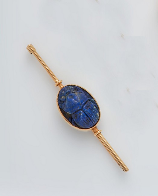BROCHE-BARRETTE en or jaune (750) ornée d'un...