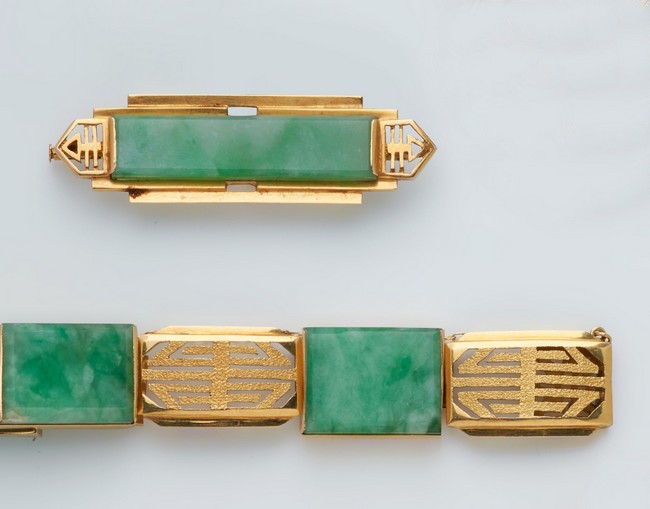BRACELET et sa BROCHE au modèle en or jaune...