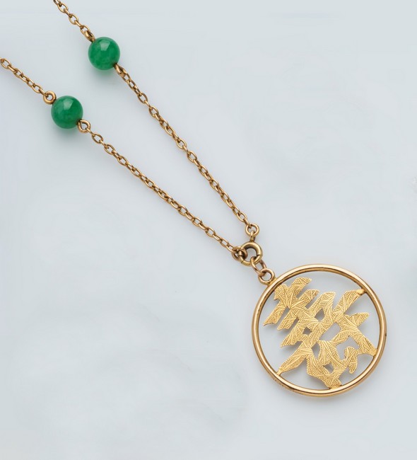 CHAÎNE et PENDENTIF en or jaune (750), le...