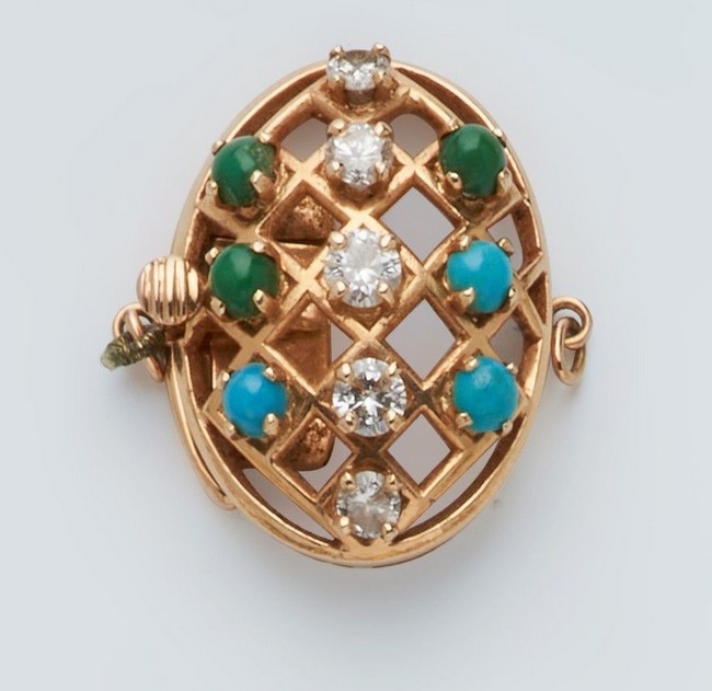 FERMOIR DE COLLIER en or (750) serti de six...