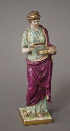 FIGURINE en porcelaine émaillée polychrome...