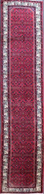 TAPIS GALERIE en laine à décor de motifs...