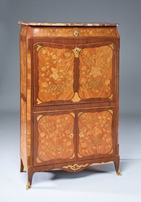 SECRÉTAIRE en placage d'amarante et bois...