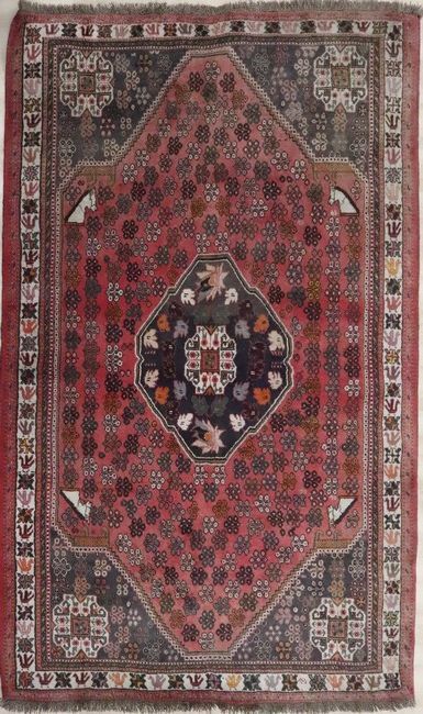 TAPIS en laine polychrome à décor de fleurettes...