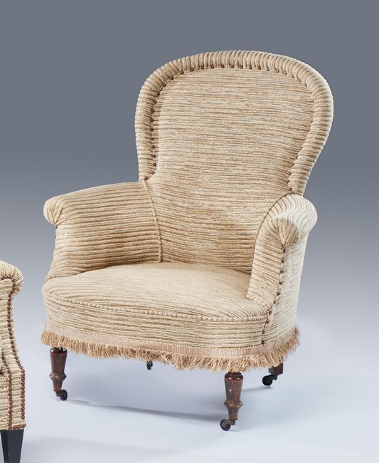 FAUTEUIL à dossier violoné reposant sur deux...