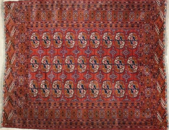 TAPIS en laine à décor de pieds d'éléphant...