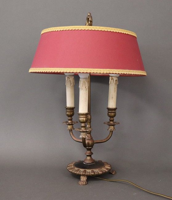 LAMPE BOUILLOTTE en bronze ciselé à trois...