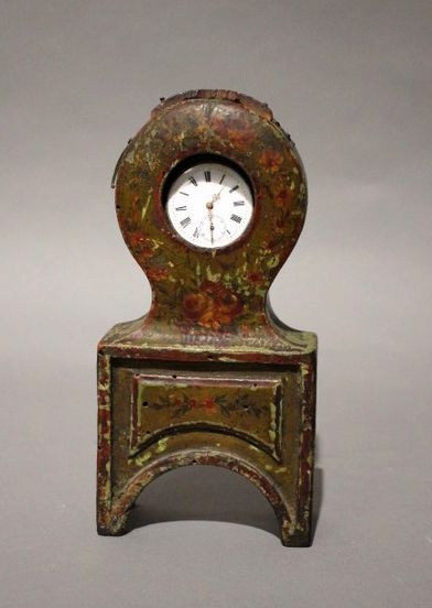 PORTE-MONTRE en forme de pendule tête de...