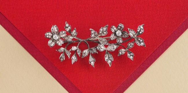 BROCHE feuillage en argent (800) et or (750)...