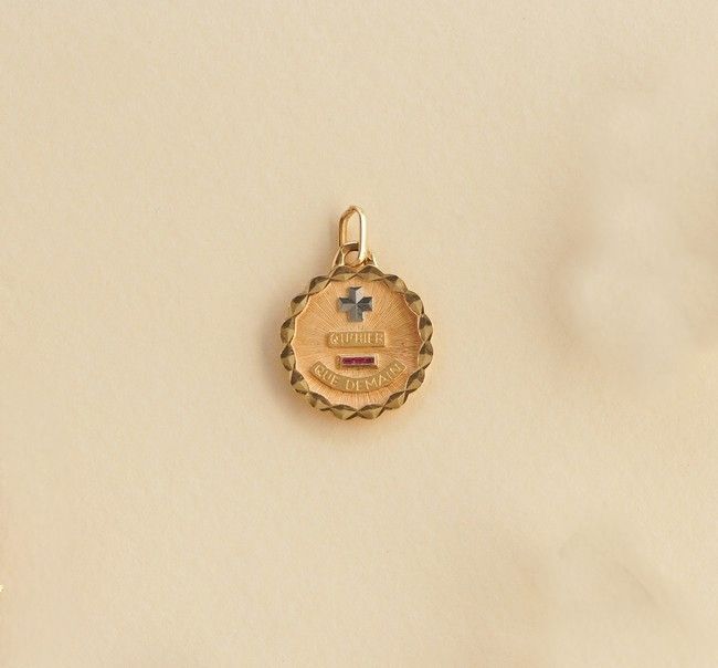 MEDAILLE D'AMOUR en or (750) et pierres.