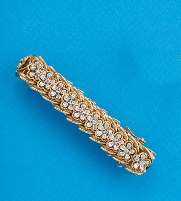 BRACELET en or (750) à maillons articulés...