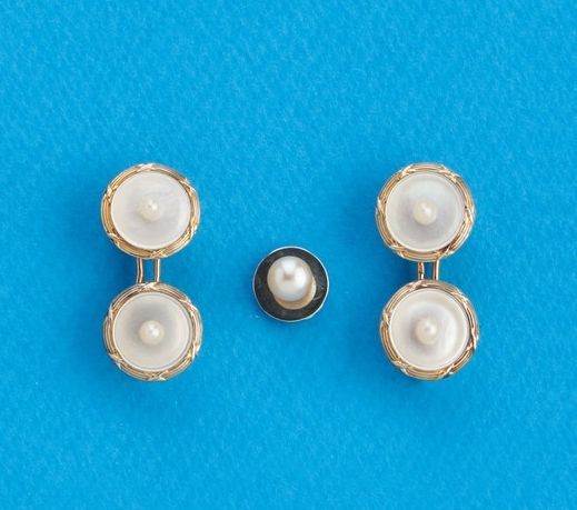 PAIRE DE BOUTONS DE MANCHETTES en or jaune...