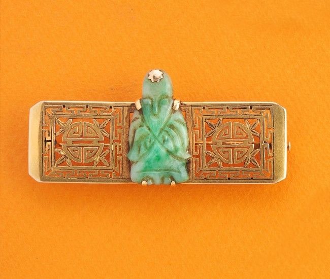BROCHE-BARRETTE en or jaune (750) ornée au...