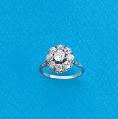 BAGUE marguerite en platine et or gris (750)...