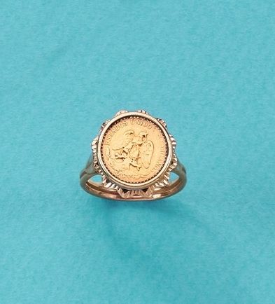 BAGUE en or (750) ornée d'une pièce en or...