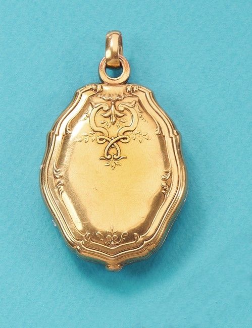 PENDENTIF MIROIR en or (750) et argent (800)....