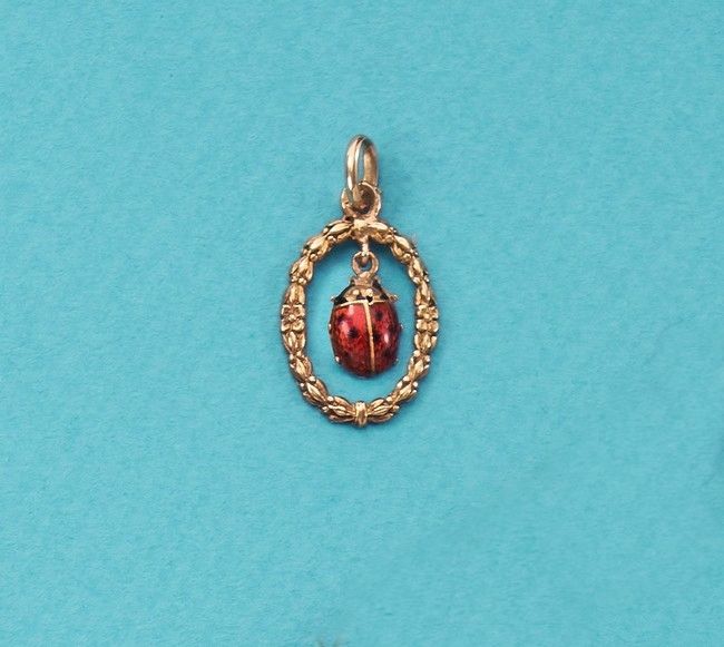 CHARMANT PENDENTIF en or (750) figurant une...