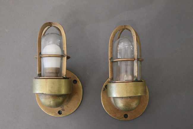 PAIRE D'APPLIQUES DE MARINE en laiton doré...