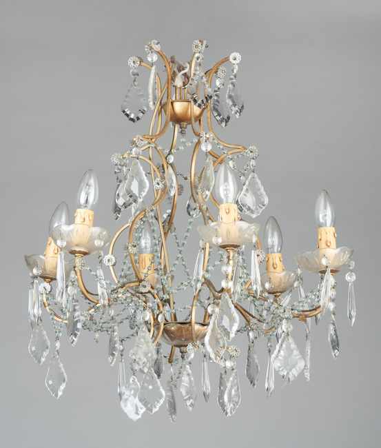 LUSTRE en métal doré ajouré à décor de pampilles...