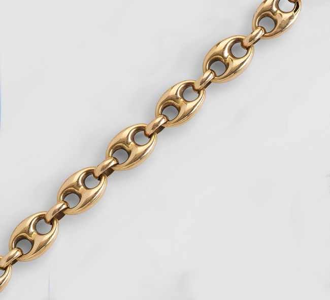 BRACELET en or jaune (750) à mailles grains...